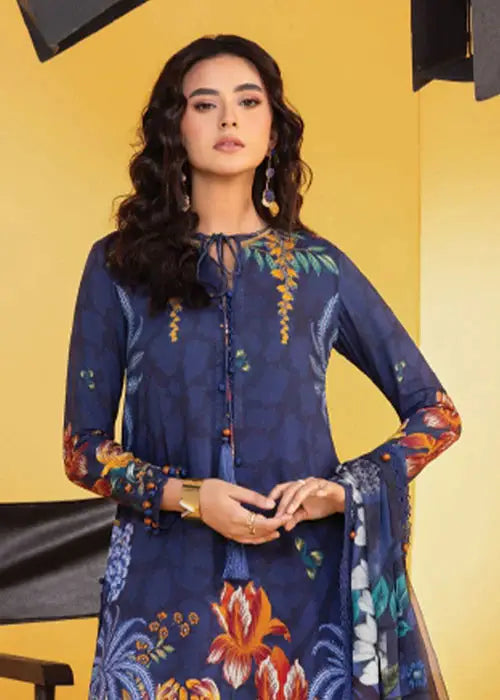 Close-up of MB-CUS25-1109-B shirt showing intricate floral print, tassel tie neckline, and detailed sleeve design in rich navy linen fabric.