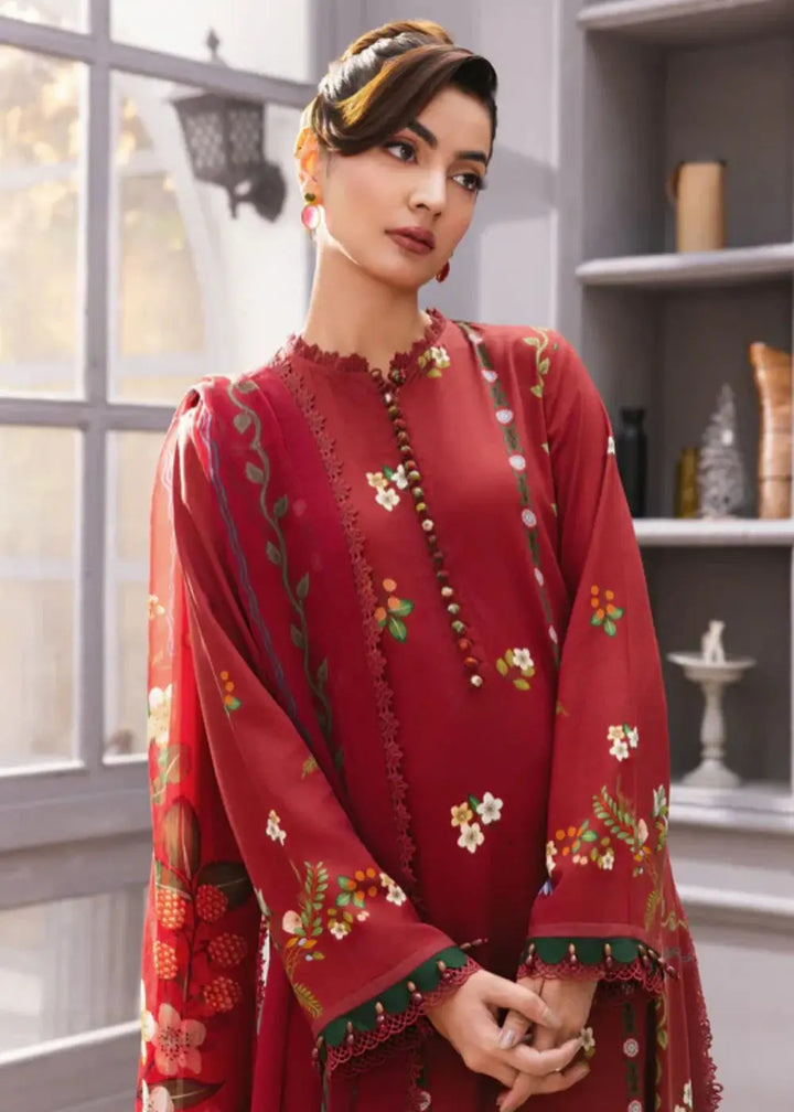 Close-up of MB-CUS25-1105-A stitched Maria.B suit showing intricate floral embroidery and button detailing on red winter shirt.
