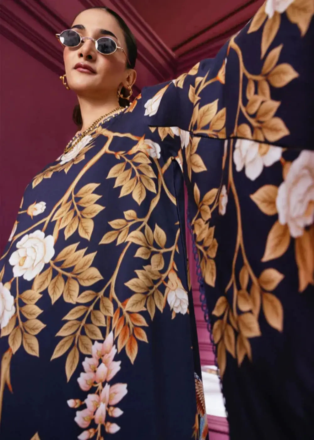 Detailed view of MB-CUS25-1102-A stitched dress highlighting floral digital print on navy linen fabric, perfect for winter daily wear.