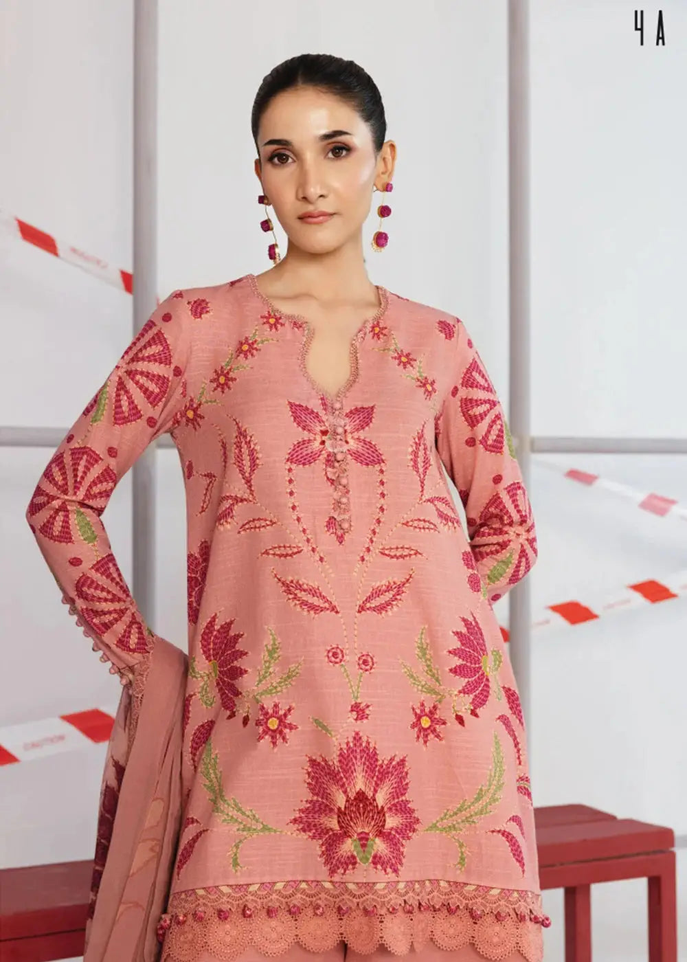 Close-up of MB-CUS25-1104-A Maria.B Ready to Wear shirt with intricate floral embroidery in pink and red on slub khaddar fabric.