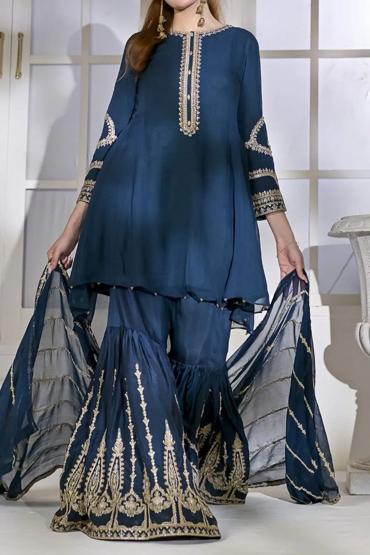 Rafia Chiffon Occasions N2429 zinc-blue formal shirt, gharara, and dupatta set with intricate gold embroidery for Pakistani women's clothing.