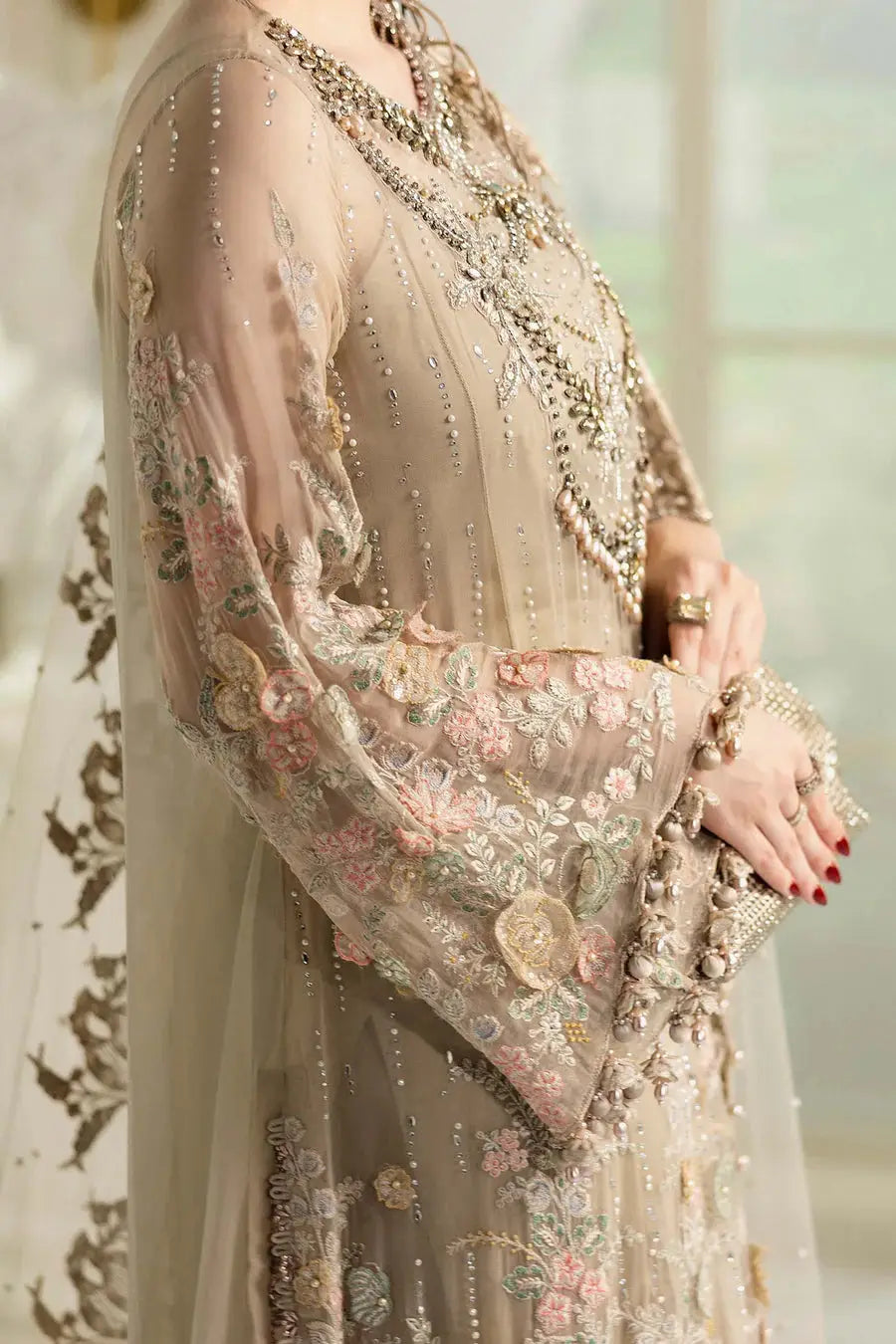 Close-up of Rangreza AL-4356 sleeve embroidery showcasing pastel floral threadwork and delicate embellishments on chiffon fabric.