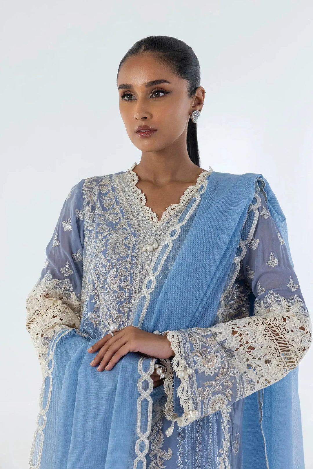 Sana Safina SS24EXE152P3 close-up of blue embroidered traditional outfit showcasing detailed lacework and matching dupatta.