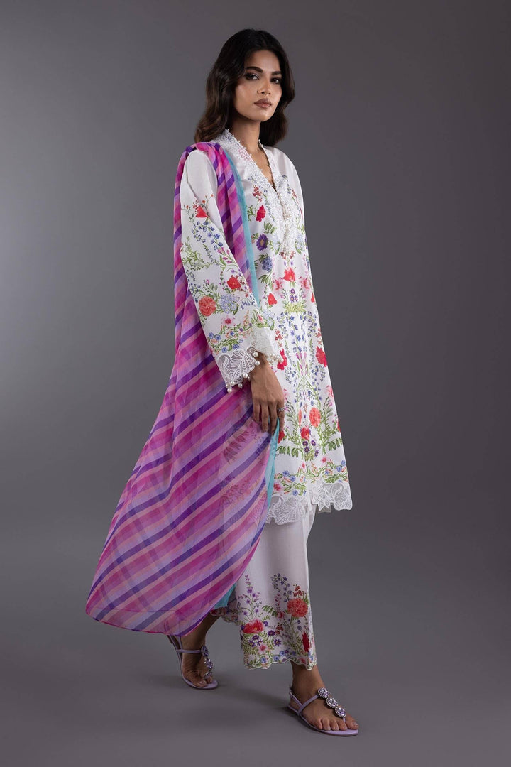 SANA SAFINA 3 Piece Lawn Suit with digital floral print and embroidered neckline, paired with a purple checkered chiffon dupatta and culotte pants.