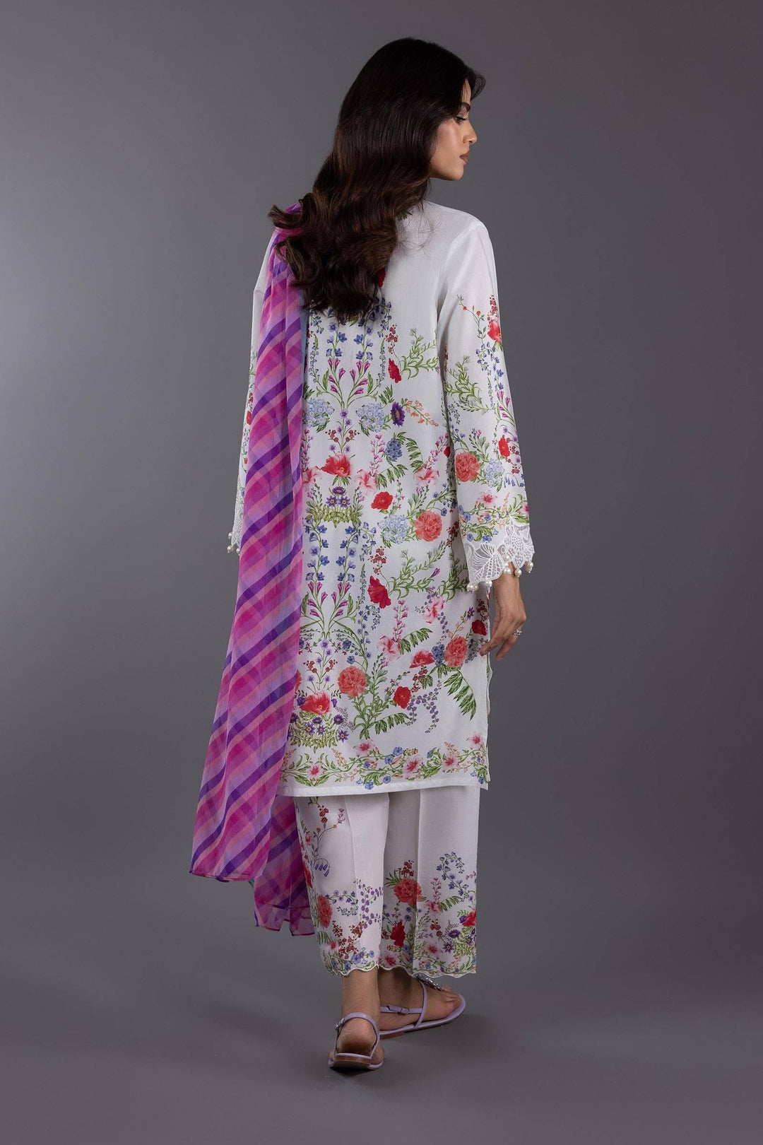 Back view of SANA SAFINA Digital Printed Lawn Suit featuring floral embroidery and chiffon dupatta in purple hues, ideal for festive wear.