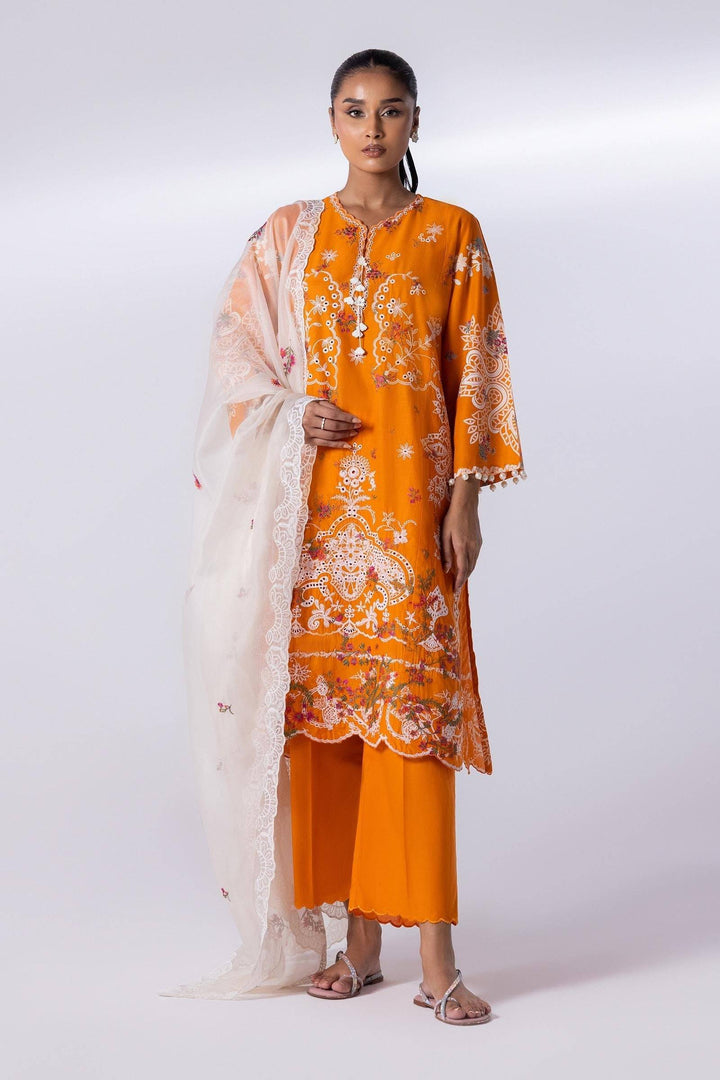 SANA SAFINA Lawn Suit - 3 Piece in vibrant orange with white embroidery, featuring culotte pants and a sheer net dupatta. Traditional festive wear.