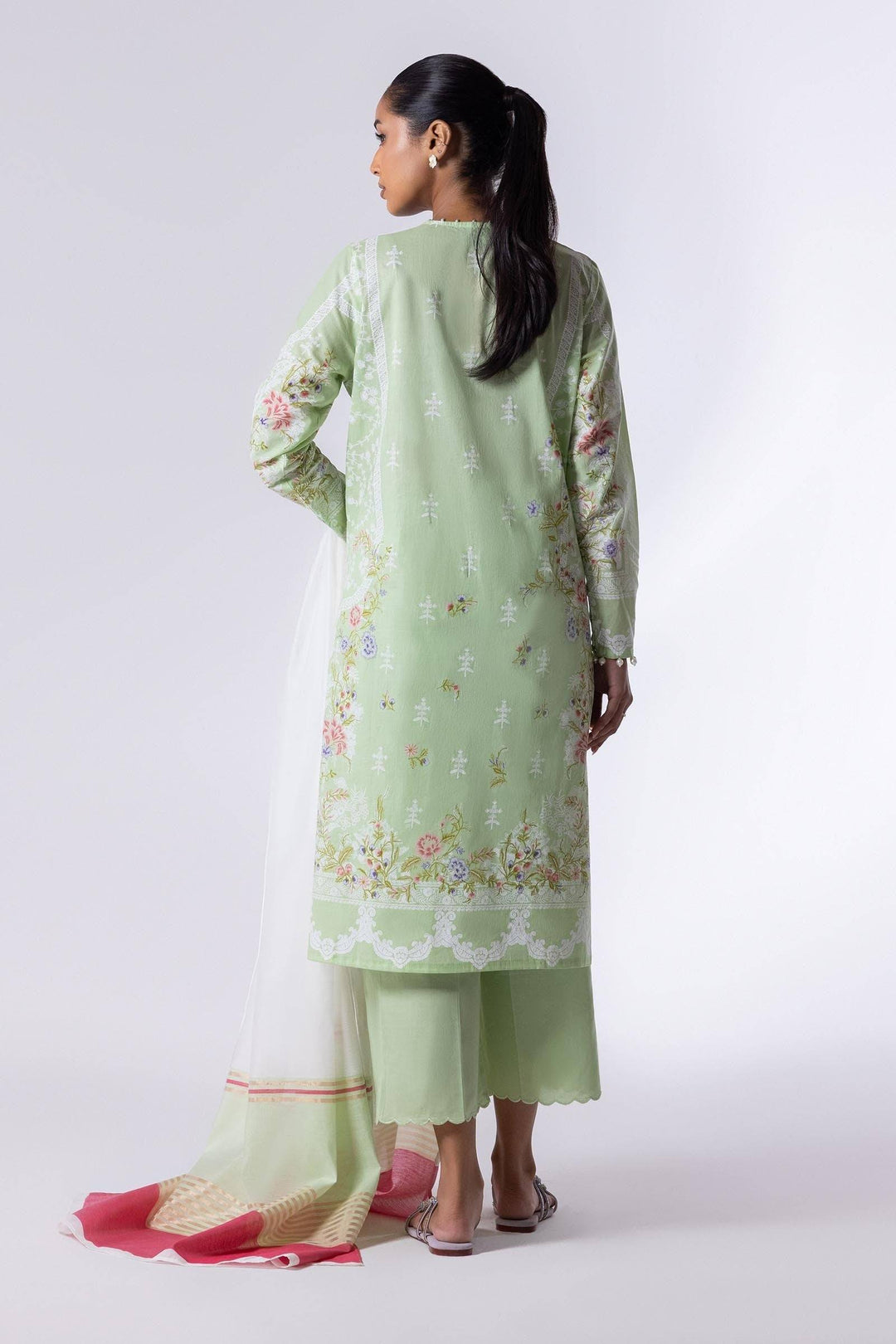 Back view of SANA SAFINA Embroidered Lawn Suit featuring intricate floral embroidery and scalloped culotte pants. Includes white dupatta.