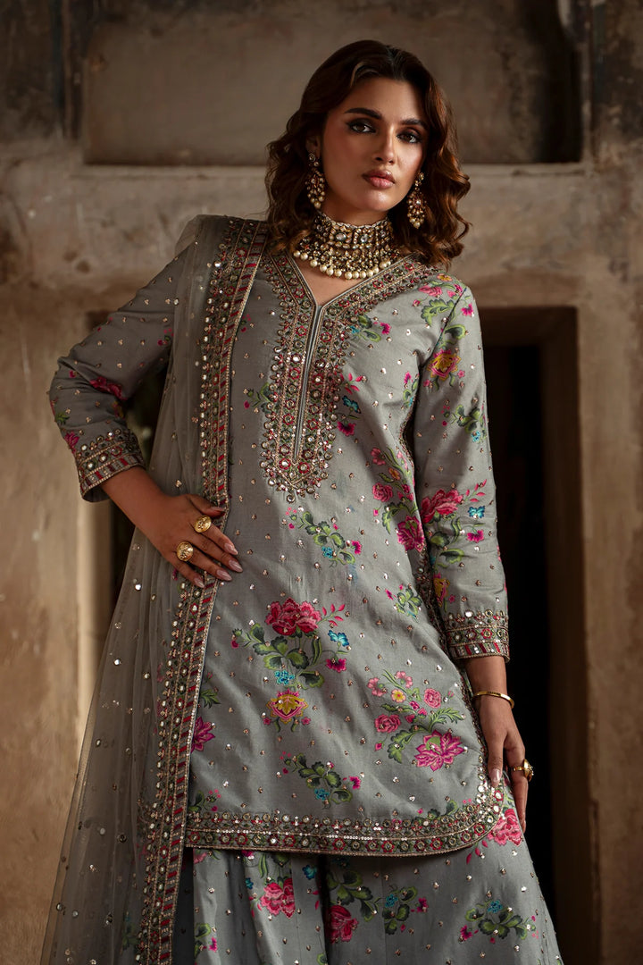 Woman in grey embroidered silk 3-piece suit with floral embroidery and sequin work, traditional attire for women