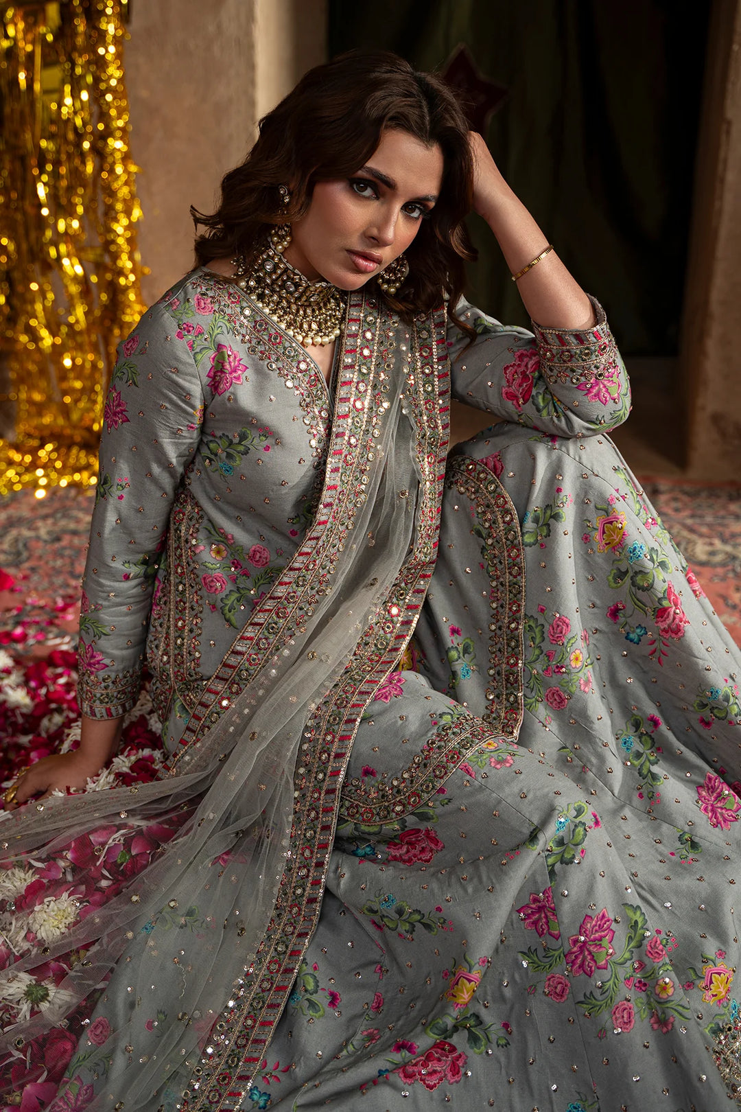Embroidered silk suit with floral patterns and sequin embellishments